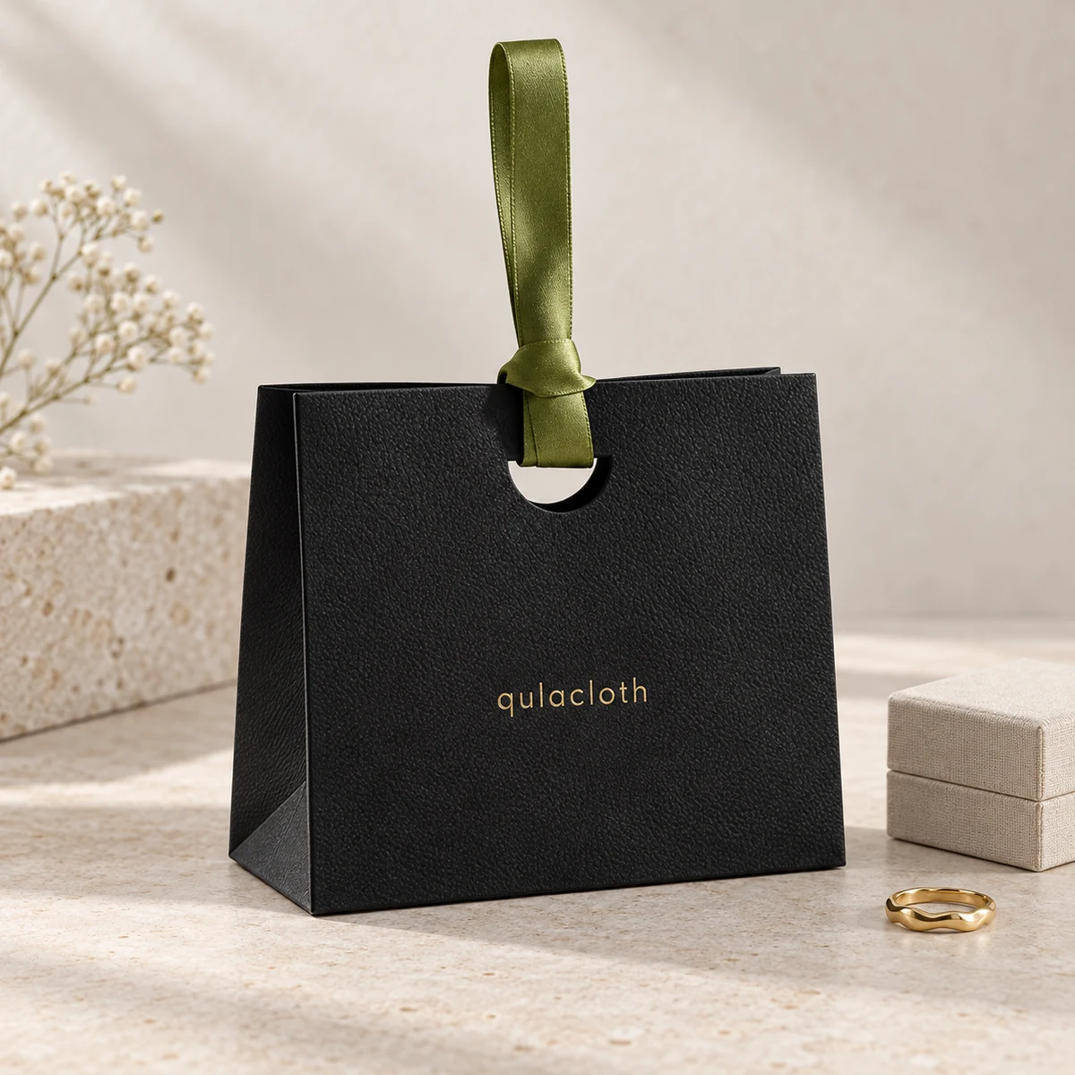 15.5 x 14.5 x 7.5 cm black textured paper jewelry shopping bag with olive satin ribbon handle
