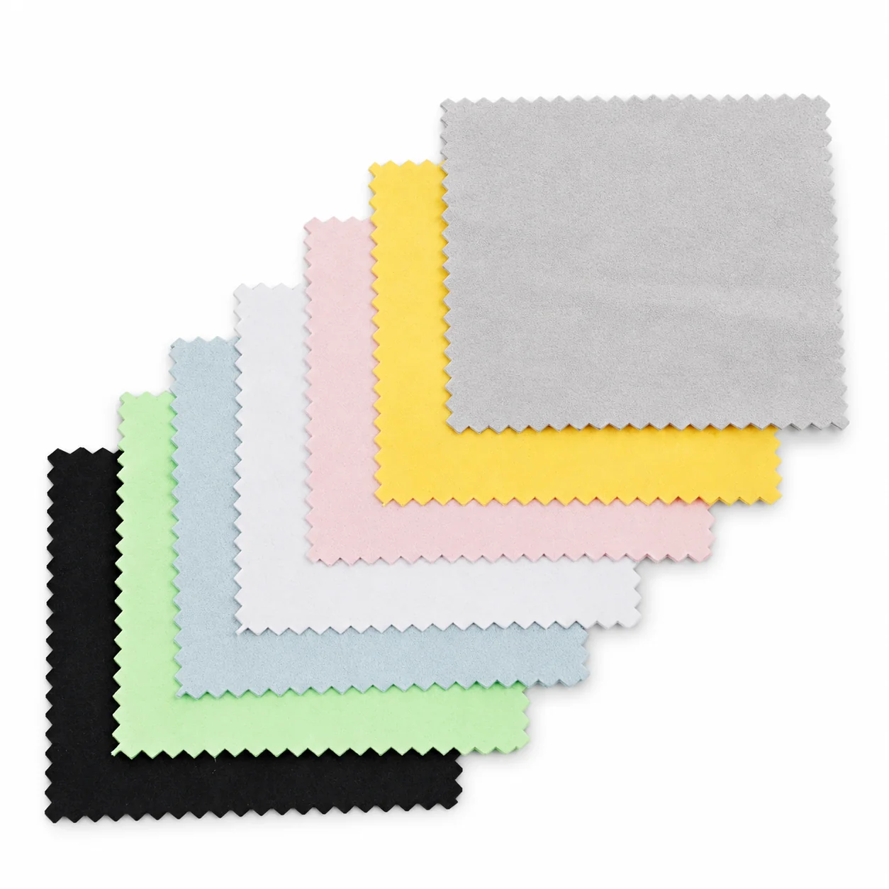 Seven assorted-color 15 x 15 cm suede-feel microfiber eyeglass and screen cleaning cloths on white