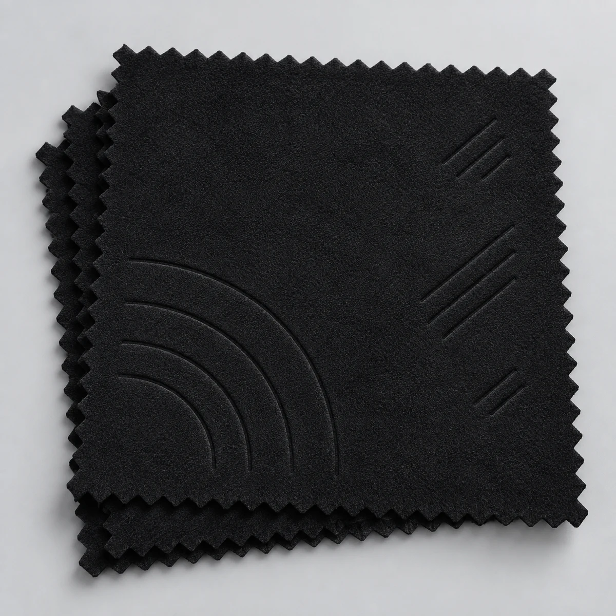 Black silver polishing cloths with embossed curved geometric lines