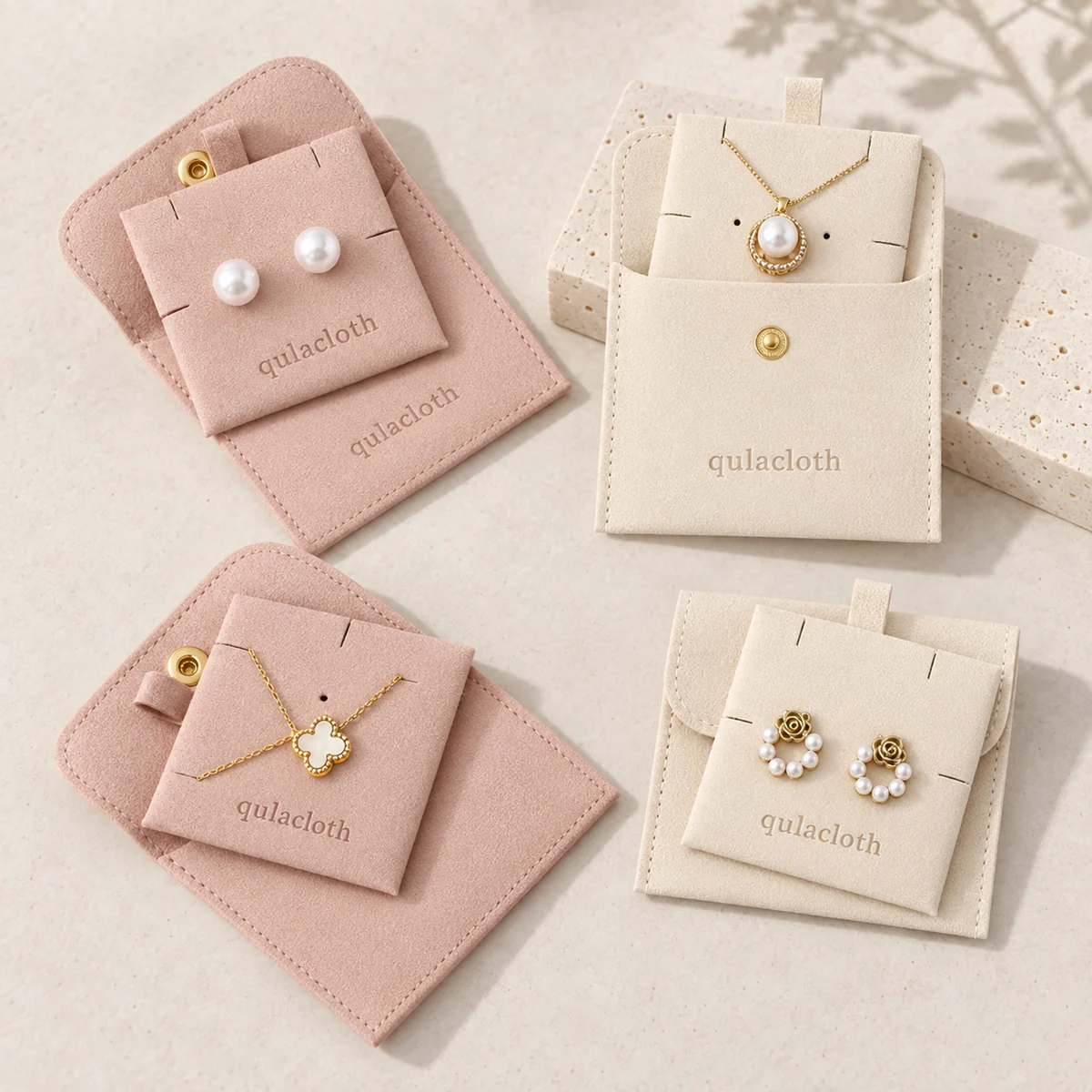 Blush and ivory microfiber jewelry pouches with earring and necklace insert cards