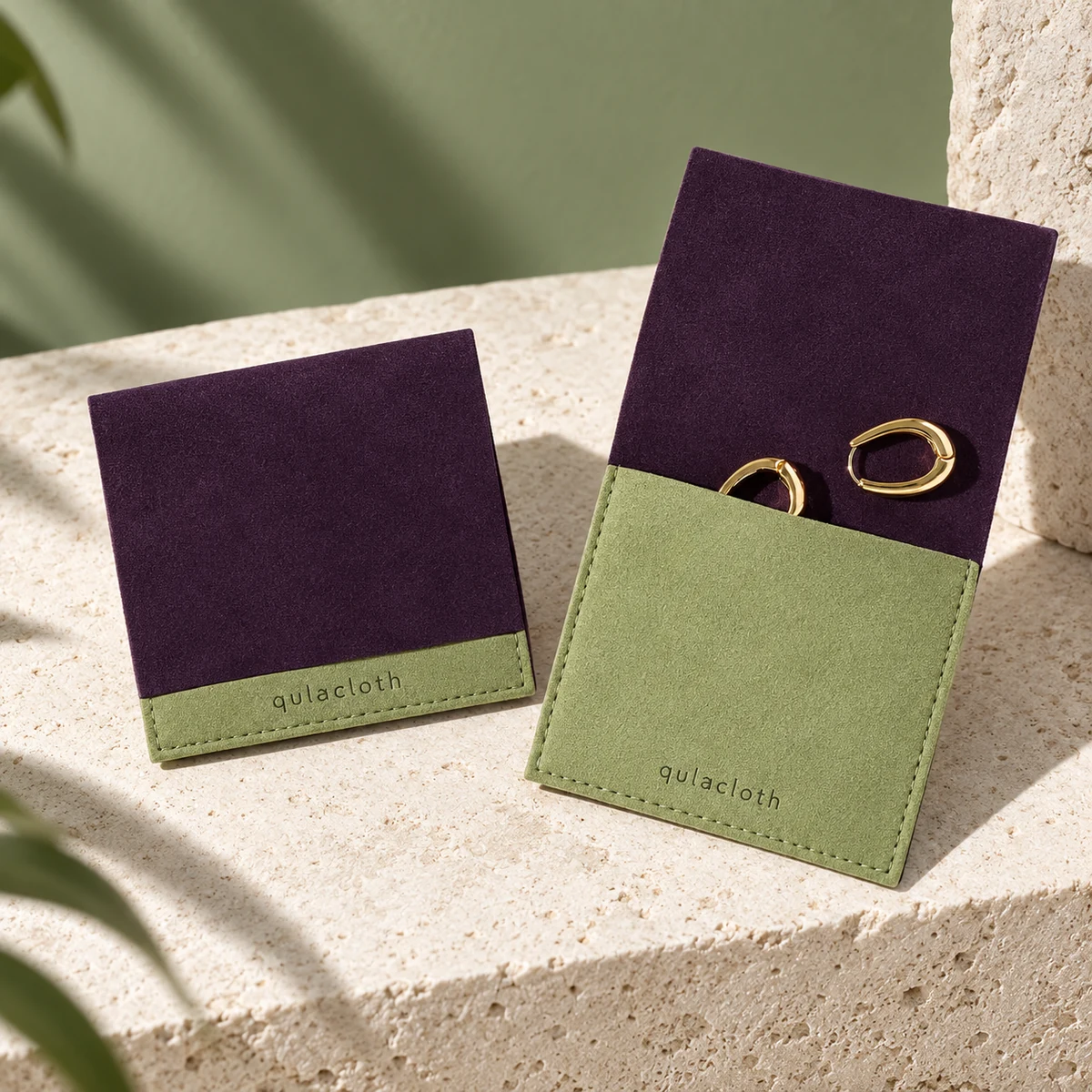 Purple and sage microfiber earring pouch shown closed and open with gold hoop earrings