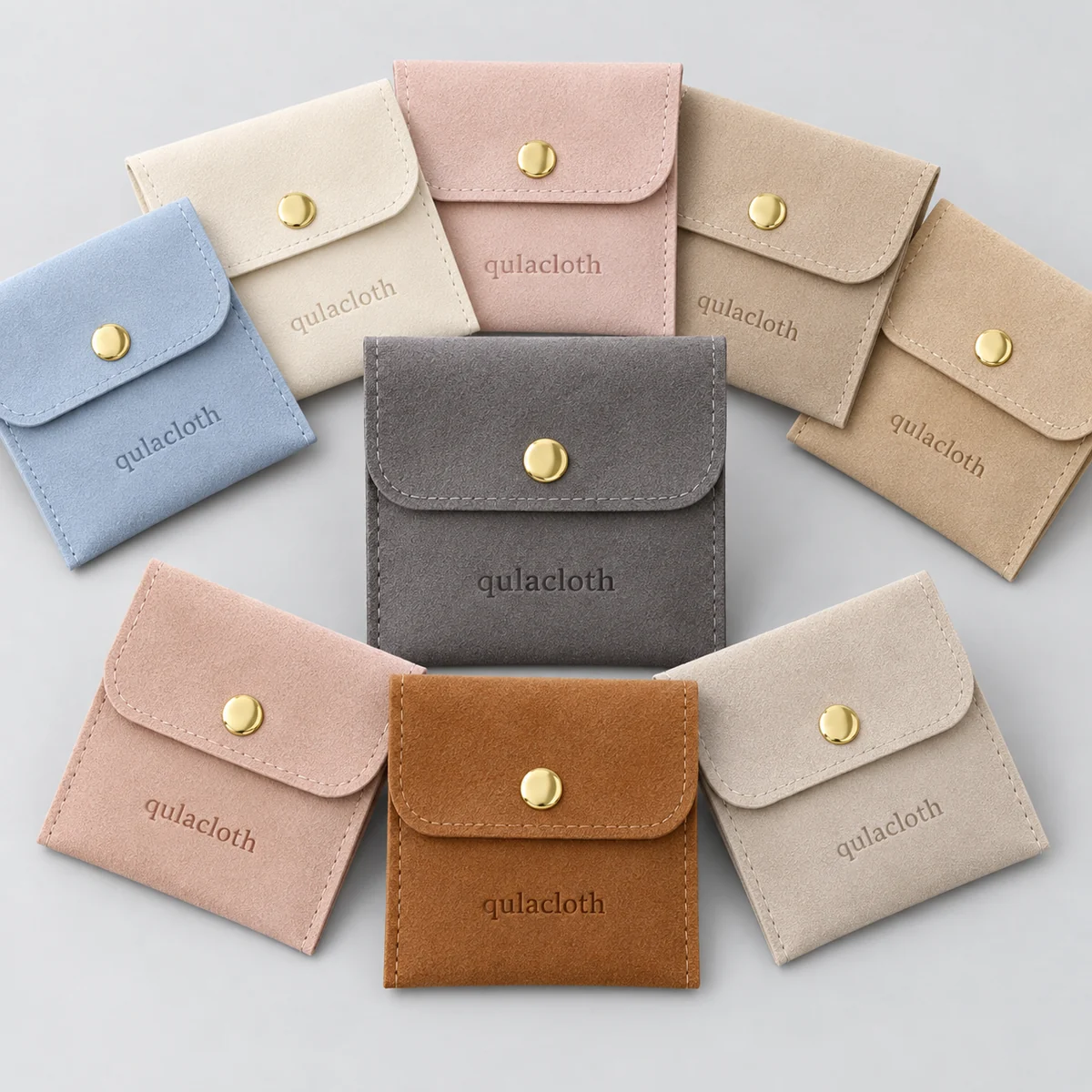 Wholesale microfiber snap-button jewelry pouches in eight custom color options